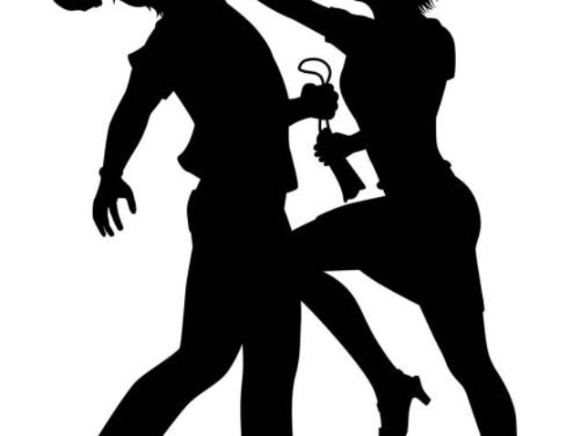Editable vector silhouette of a woman defending herself from a man trying to snatch her bag